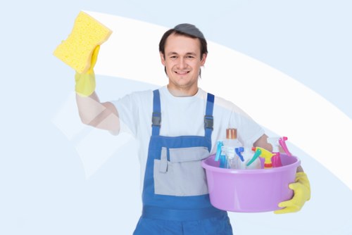Cleaner treating a stained mattress in East London