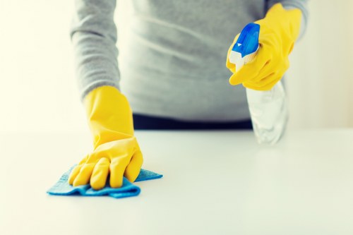Local cleaning team working in an E1 apartment building with access considerations