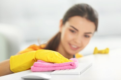 Local technician cleaning a cooker in East London